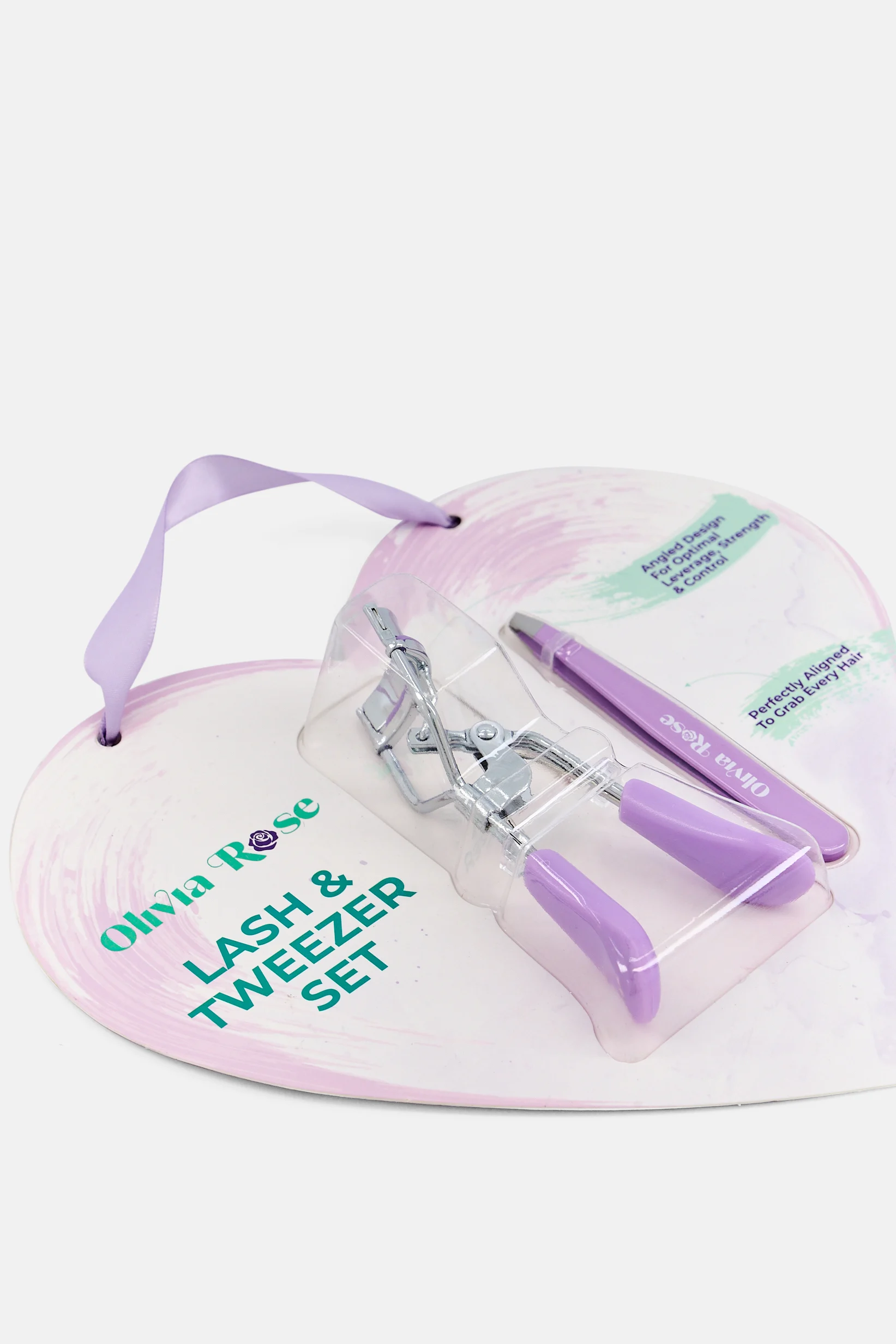 Olivia Rose eyelash curler and tweezer set close-up on heart card