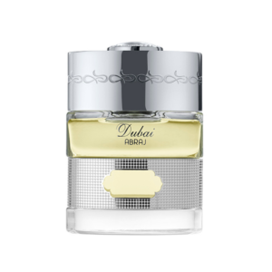 The Spirit of Dubai Abraj Eau de Parfum 50ml bottle with silver cap and silver skyline-grid band – aromatic woody chypre perfume
